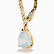 Aurora 14K Yellow Gold Opal and Diamond Dangle Earrings feature teardrop opals hanging from curved hooks with round diamonds, shown on a white background.
