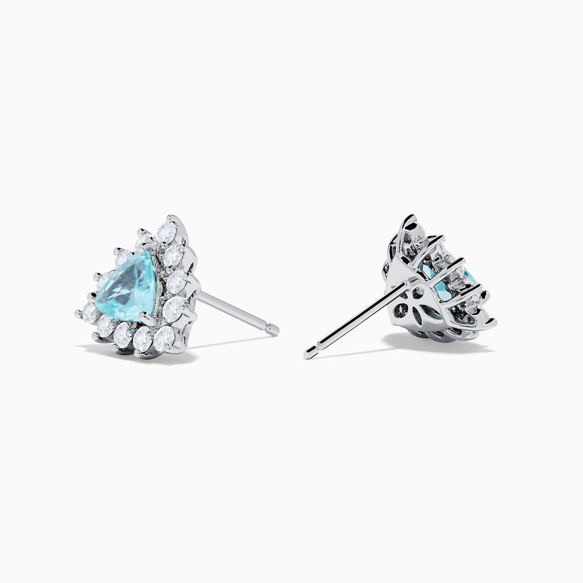 A pair of 18K white gold GIA certified Paraiba and diamond stud earrings with triangular blue gems surrounded by a halo of small diamonds, set in silver, displayed on a white background.