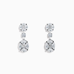 The Pave Classica 18K White Gold Diamond Drop Earrings feature clusters of sparkling white gemstones in a floral-inspired three-section design for an elegant look.