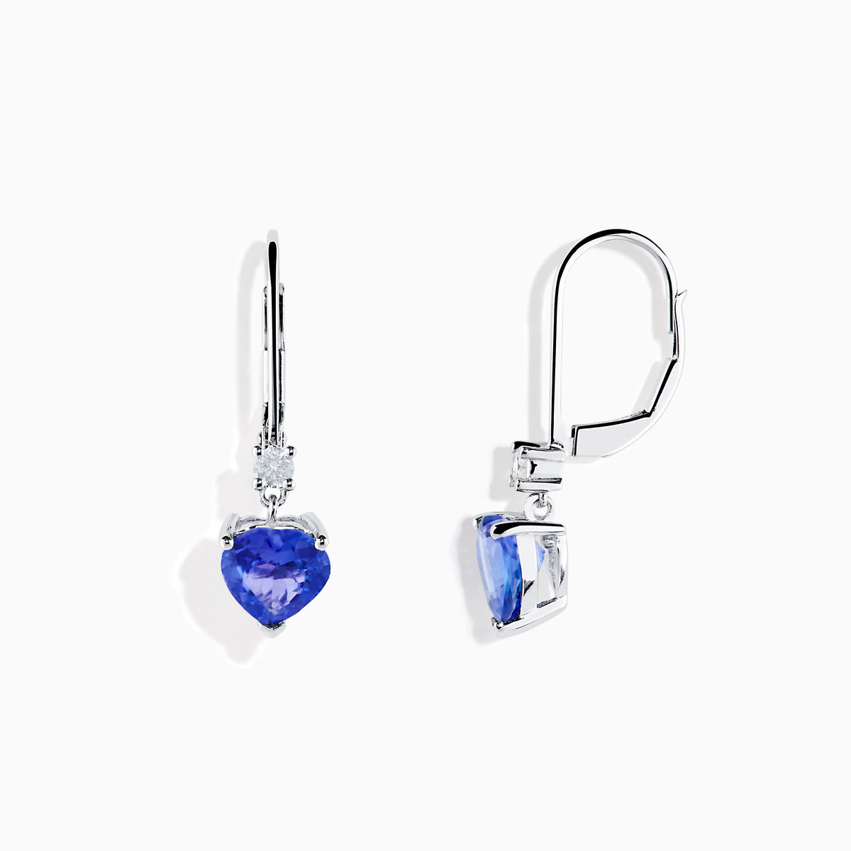 The Nahla Siri 14K White Gold Tanzanite and Diamond Leverback Earrings feature heart-shaped blue tanzanite stones accented with sparkling diamonds, shown on a white background.