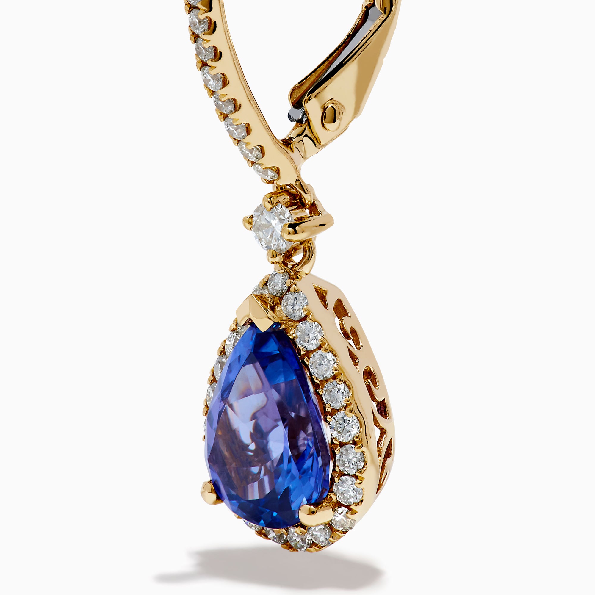 The Nahla 14K Yellow Gold Tanzanite and Diamond Dangle Halo Earrings showcase teardrop tanzanites encircled by diamonds, with extra diamonds on the hooks, all set against a white background.