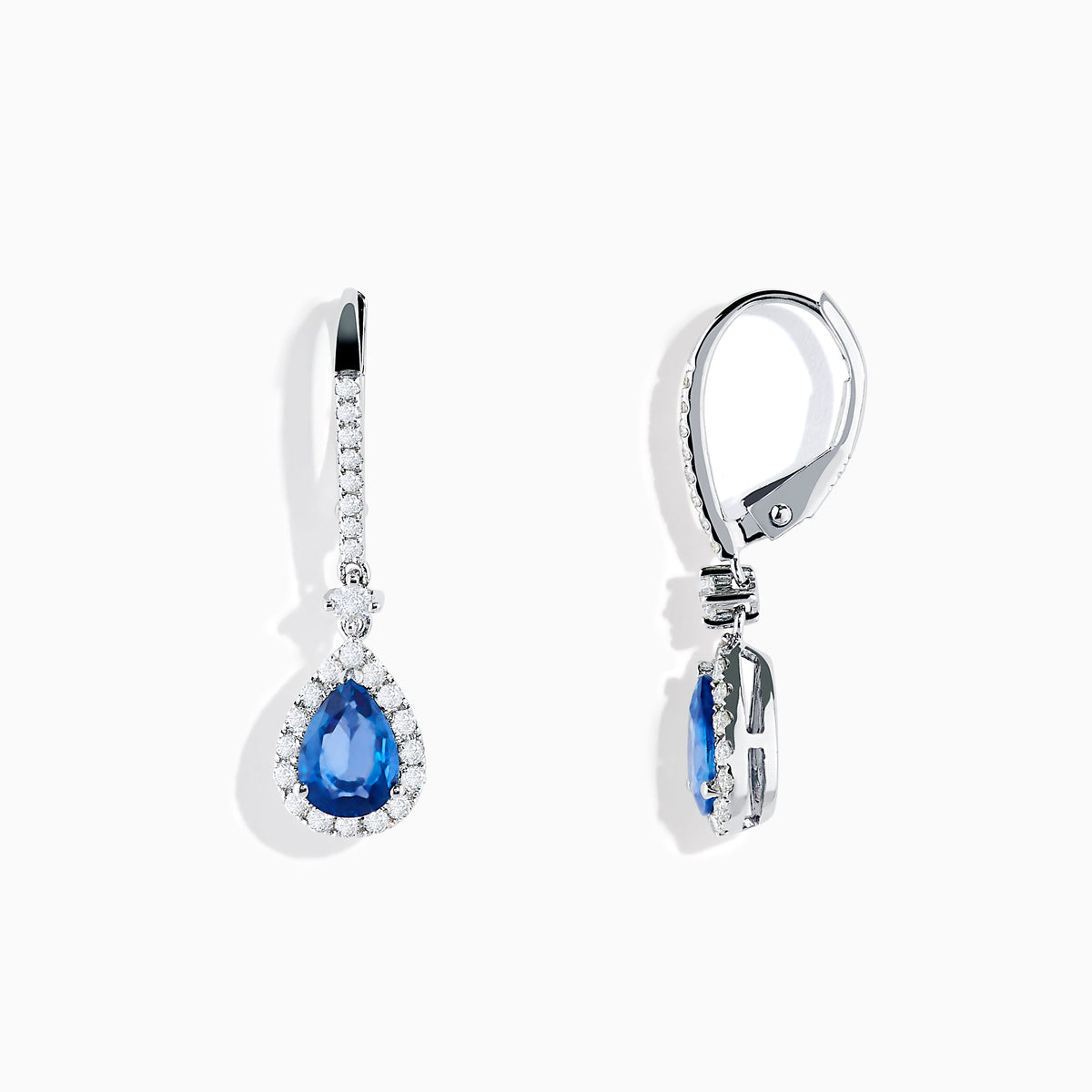 The 14K White Gold Pear Shape Blue Sapphire and Diamond Drop Earrings feature teardrop-shaped sapphires surrounded by white diamonds, set in elegant white gold, shown on a white background.