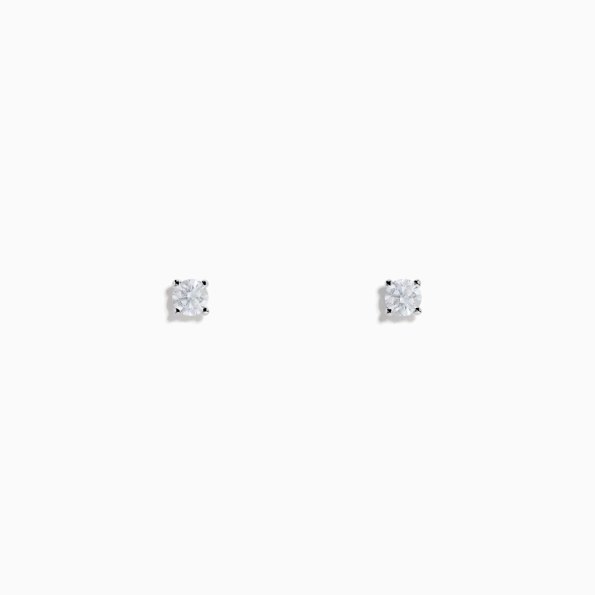 Displayed on a white background, the 14 Karat White Gold Diamond Stud Earrings feature 0.20TCW round diamonds set in simple prongs.