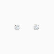 Two 14 karat white gold diamond stud earrings with 0.40TCW round diamonds shine in silver prong settings against a white background—perfect for timeless elegance.