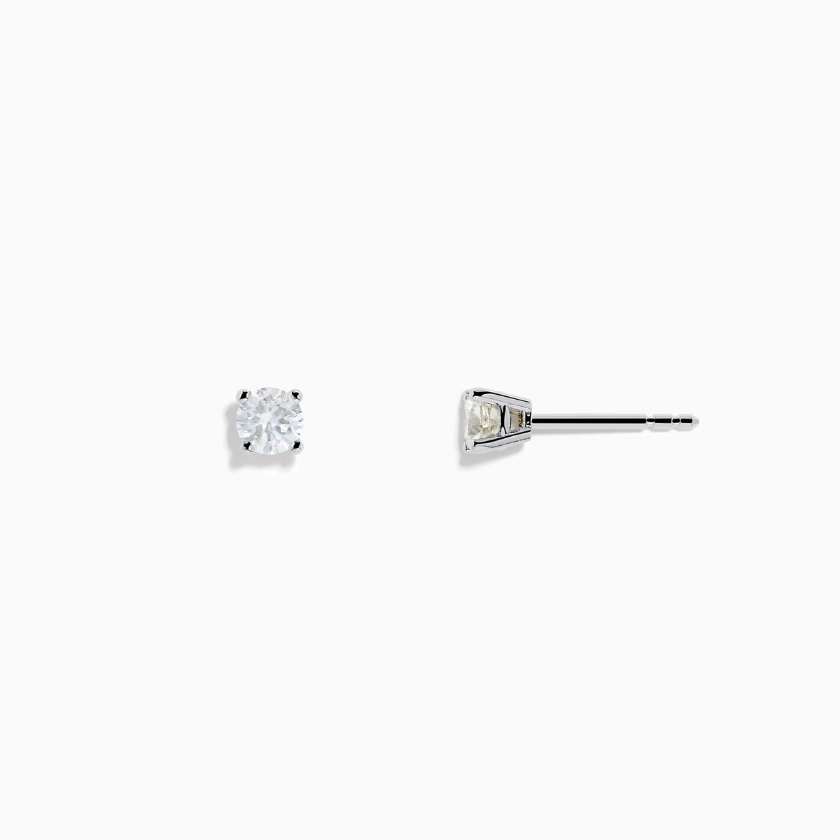 Two 14 karat white gold diamond stud earrings with 0.40TCW round diamonds shine in silver prong settings against a white background—perfect for timeless elegance.
