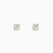 The 14 Karat White Gold Diamond Stud Earrings feature 1.50TCW round diamonds in classic prong settings, shown on a plain white background.