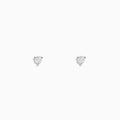 A pair of 14 karat white gold stud earrings featuring 0.20TCW round diamonds, displayed against a plain white background.