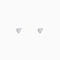 A pair of 14 karat white gold stud earrings featuring 0.33TCW round diamonds, shown in a minimalist prong setting against a plain white background.