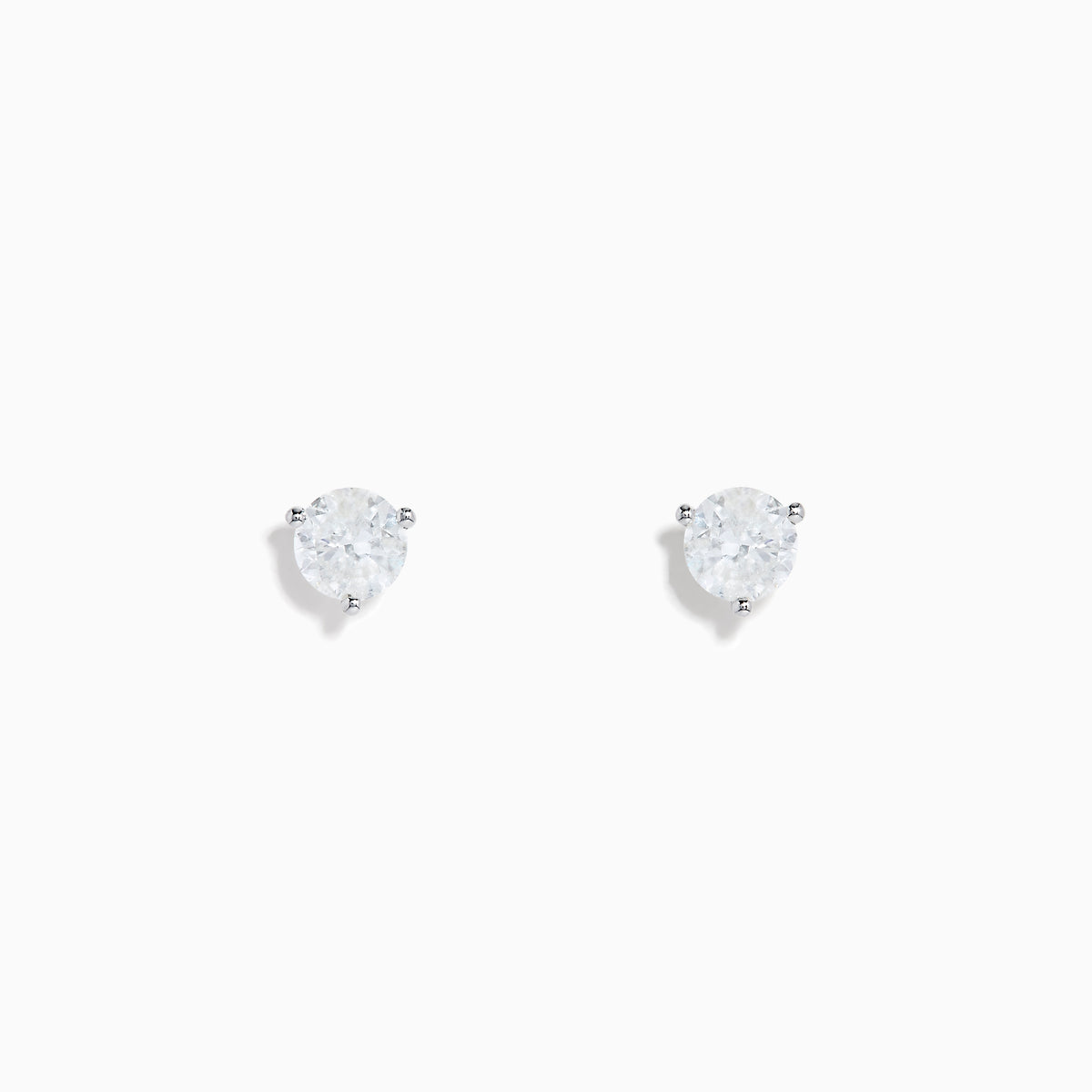 A pair of 14 Karat White Gold Diamond Stud Earrings with 1.00TCW round diamonds is displayed on a plain white background.