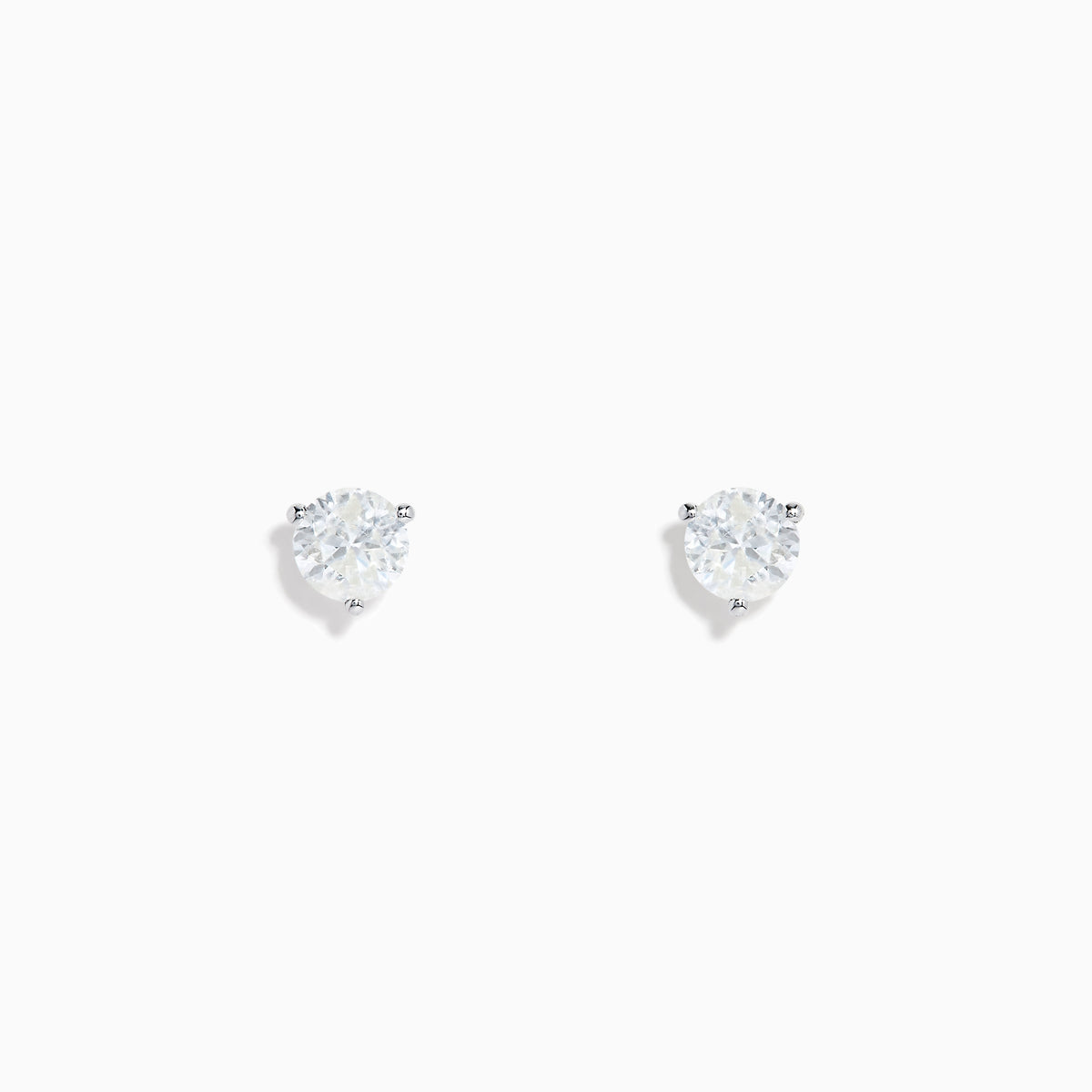 A pair of 14 Karat white gold diamond stud earrings featuring 1.25TCW round diamonds, displayed on a plain white background.