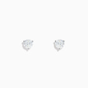 A pair of 14 Karat white gold diamond stud earrings featuring 1.25TCW round diamonds, displayed on a plain white background.