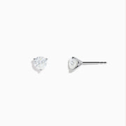 A pair of 14 Karat white gold diamond stud earrings featuring 1.25TCW round diamonds, displayed on a plain white background.