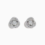 The 18K White Gold Diamond Love Knot Stud Earrings feature interlocking loops with sparkling diamonds and a central pear-shaped diamond, all set in elegant white gold against a plain white background.