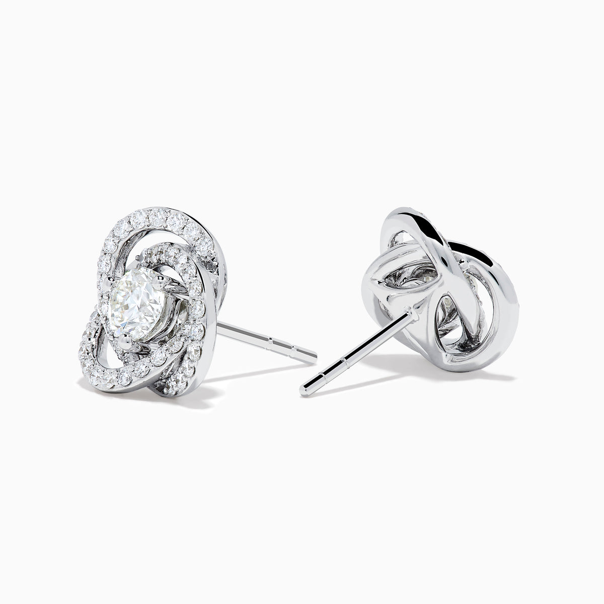 The 18K White Gold Diamond Love Knot Stud Earrings feature interlocking loops with sparkling diamonds and a central pear-shaped diamond, all set in elegant white gold against a plain white background.