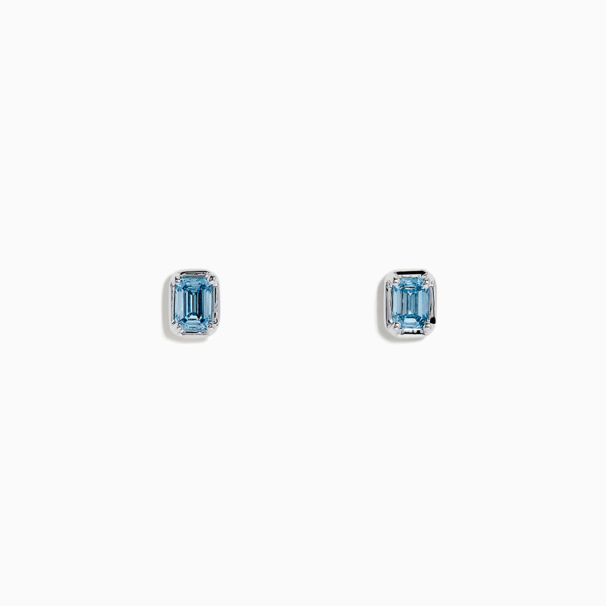 Lab Grown Blue Diamond Emerald Cut Solitaire Stud Earrings in 14K White Gold, each showcasing a stunning lab grown blue diamond in a classic, minimalist setting and presented on a plain white background.