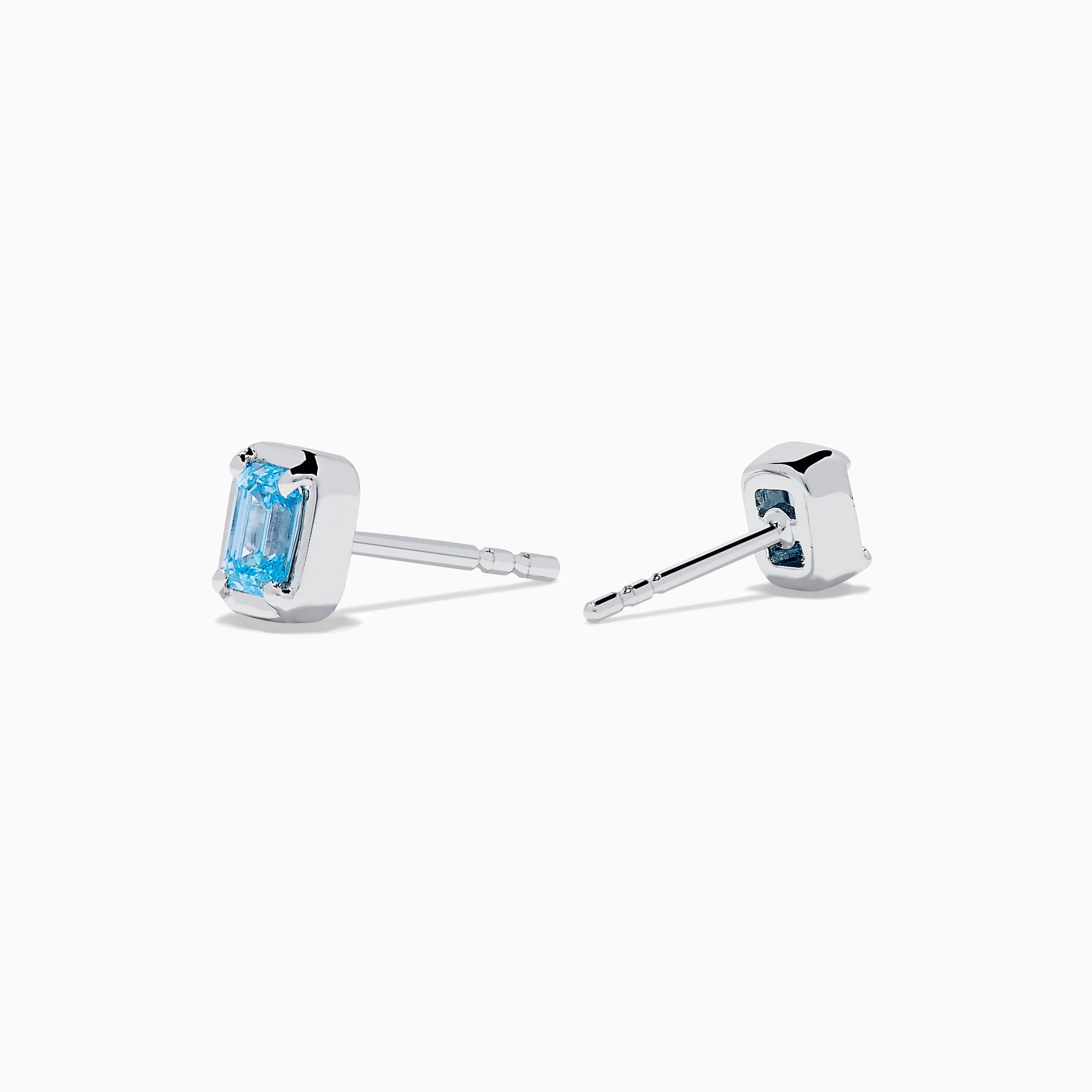 Lab Grown Blue Diamond Emerald Cut Solitaire Stud Earrings in 14K White Gold, each showcasing a stunning lab grown blue diamond in a classic, minimalist setting and presented on a plain white background.