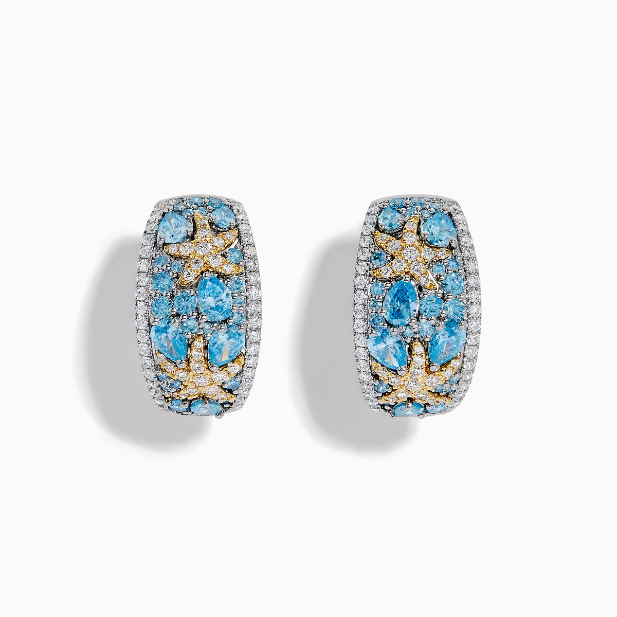 Lab Grown Blue Diamond Star Fish Hoop Earrings in 14K Two Tone Gold featuring stunning lab grown blue diamonds.