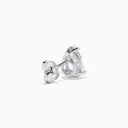 Lab Grown Diamond Pear Shaped 1.96ct Stud Earrings in 14K White Gold gleam with sparkling brilliance, their elegant design standing out against a plain white background.