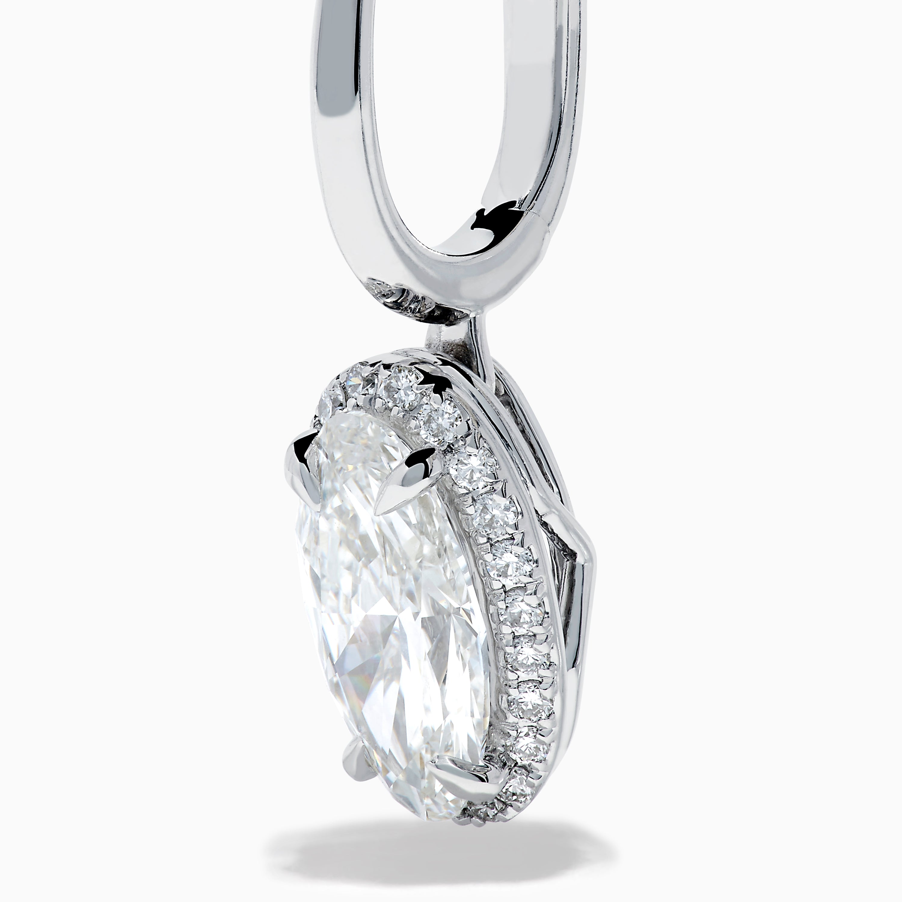 The Lab Grown Diamond Elongated Oval Drop Earrings in 14K White Gold feature clear gemstones surrounded by lab grown diamonds, set in polished white gold with a simple hook design, displayed against a white background.