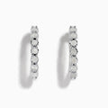 The 925 Silver Diamond Hoop Earrings feature a row of round, white gemstones and are displayed on a plain white background.
