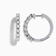 The 925 Silver Diamond Hoop Earrings feature a row of round, white gemstones and are displayed on a plain white background.