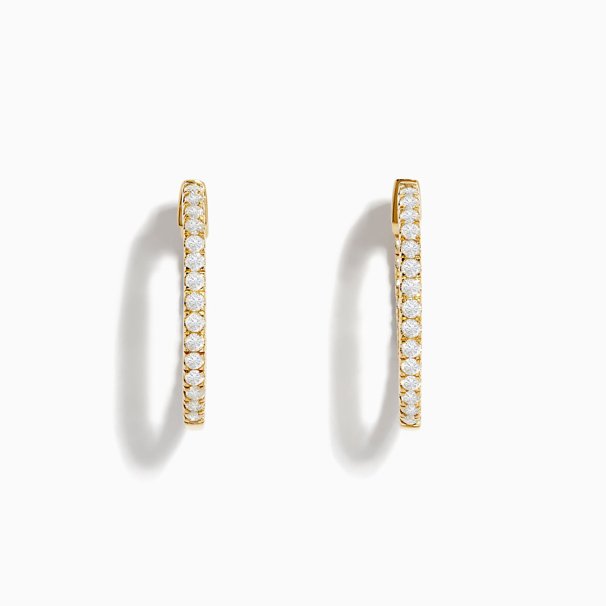 The 14K Yellow Gold 3/4 Diamond Hoop Earrings (0.74 TCW) are shown against a white background—one from the side, one from the front—to showcase their sparkling white diamonds and dazzling brilliance.