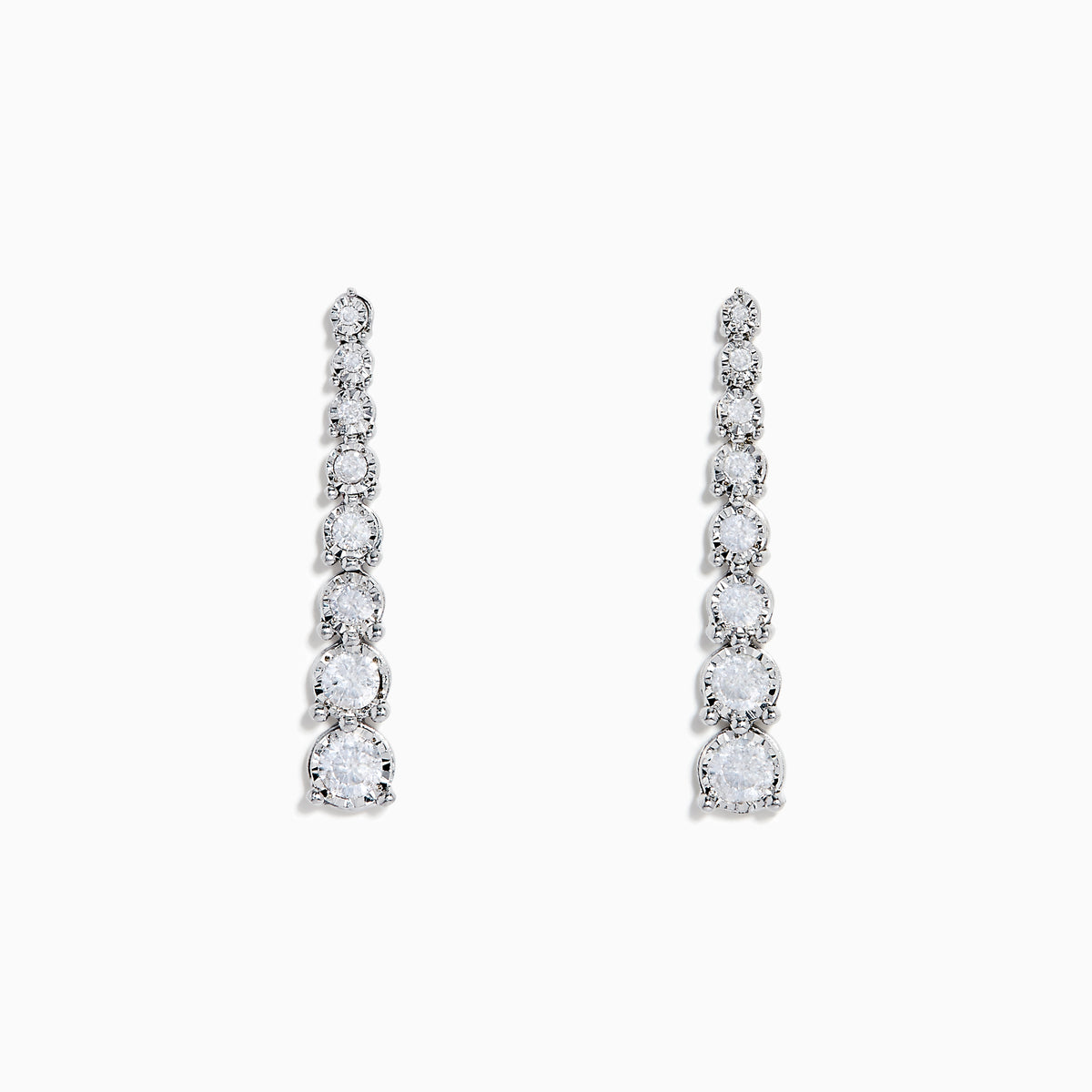 The 925 Sterling Silver Diamond Linear Drop Earrings showcase a vertical row of round, graduated diamonds that increase in size towards the bottom.
