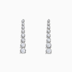 The 925 Sterling Silver Diamond Linear Drop Earrings showcase a vertical row of round, graduated diamonds that increase in size towards the bottom.