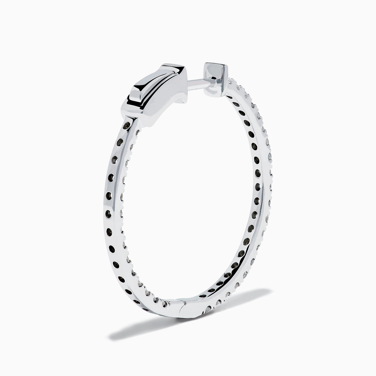 The Pave Classica 14K White Gold Diamond Hoop Earrings, encrusted with sparkling diamonds, are shown against a white background with soft shadows cast to the left.