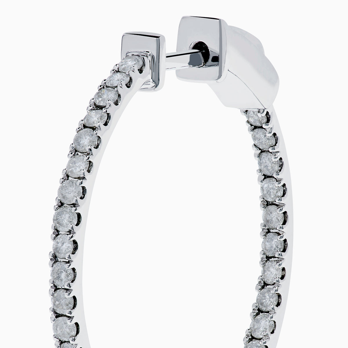 The Pave Classica 14K White Gold Diamond Hoop Earrings, encrusted with sparkling diamonds, are shown against a white background with soft shadows cast to the left.