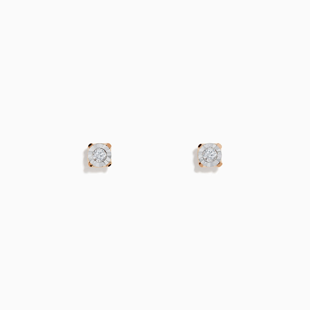 A pair of 14K white & rose gold diamond solitaire stud earrings, 0.10 TCW, shown on a plain white background.