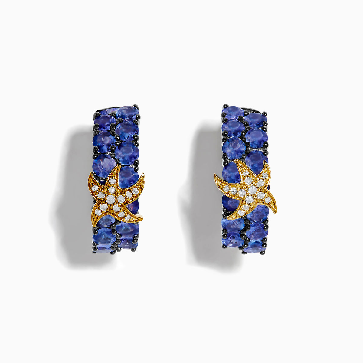 Nahla Siri 925 Silver & 18KY Tanzanite and Diamond Starfish Earrings feature starfish-shaped accents with sparkling diamonds and vivid tanzanite on each hoop, displayed against a plain white background.