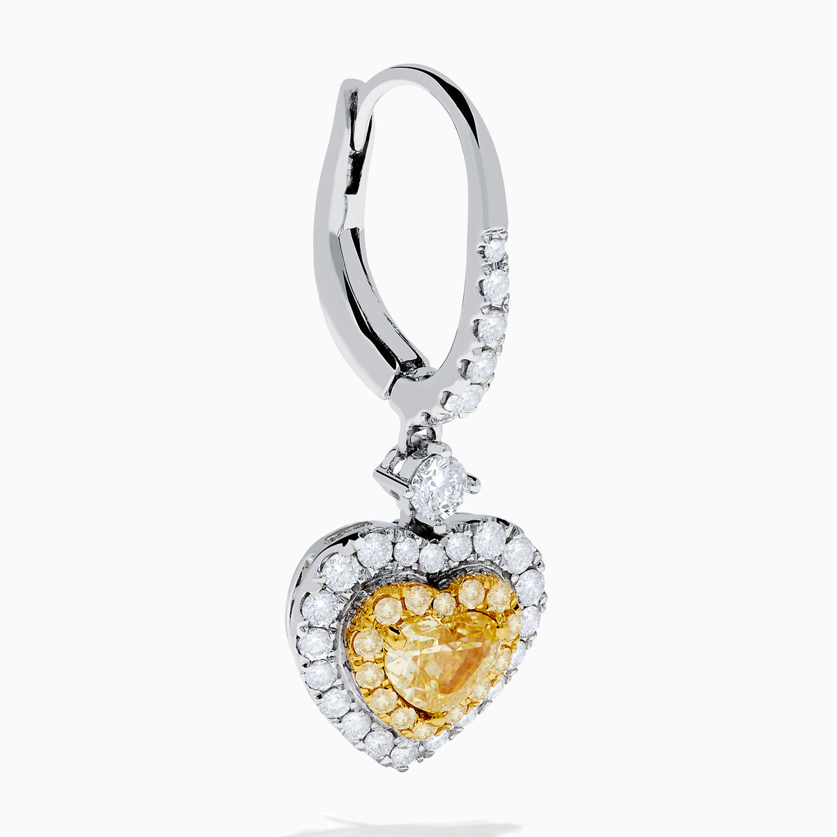 The Canare 18K Two Tone Gold White & Yellow Diamond Heart Earrings feature heart-shaped yellow stones, a halo of white diamonds, and diamond-accented hooks for elegant sparkle.