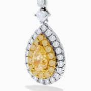 The Canare 18K Two Tone Gold White and Yellow Diamond Drop Earrings feature teardrop-shaped yellow gems encircled by white diamonds, with diamond-adorned hooks, all set in elegant two-tone gold.