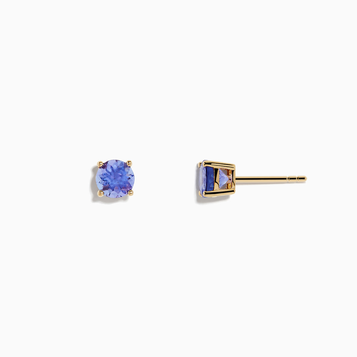 The 14K Yellow Gold Tanzanite Stud Earrings each showcase a round, faceted tanzanite in a four-prong setting, displayed on a white background.