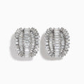 Classique 14k White Gold Diamond Earrings feature oval shapes with rows of baguette-cut diamonds in a layered, ribbed design, all set in 14k white gold against a plain white background.