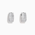 A pair of 925 Sterling Silver Diamond Accented Huggie Earrings, featuring sparkling diamond accents, is displayed on a plain white background.