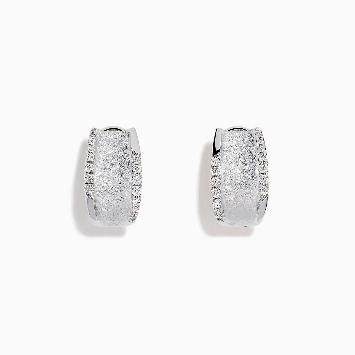 A pair of 925 Sterling Silver Diamond Accented Huggie Earrings, featuring sparkling diamond accents, is displayed on a plain white background.
