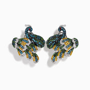 The 14K White Gold Multi Color Diamond and Ruby Peacock Earrings feature ornate peacock designs with blue, green, yellow, and clear gemstones and ruby eyes, elegantly displayed on a white background.