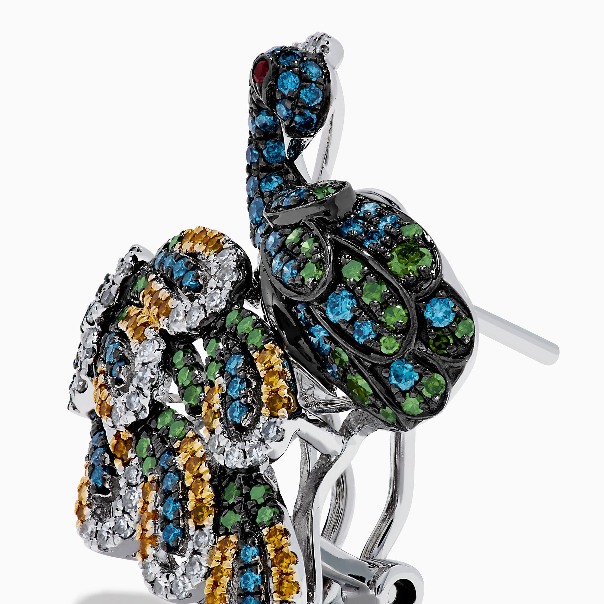 The 14K White Gold Multi Color Diamond and Ruby Peacock Earrings feature ornate peacock designs with blue, green, yellow, and clear gemstones and ruby eyes, elegantly displayed on a white background.