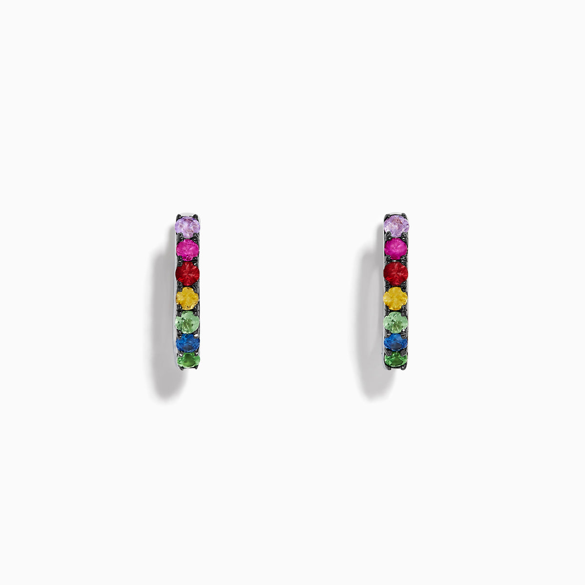 Watercolors 14K White Gold Multi Sapphire Huggie Hoop Earrings featuring multicolored sapphires set in a vertical line, showcased against a plain white background.