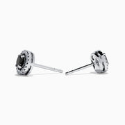 Caviar 14K White Gold Black Diamond Stud Halo Earrings, featuring oval-shaped black diamonds encircled by a halo of clear stones in 14K white gold, displayed on a white background.