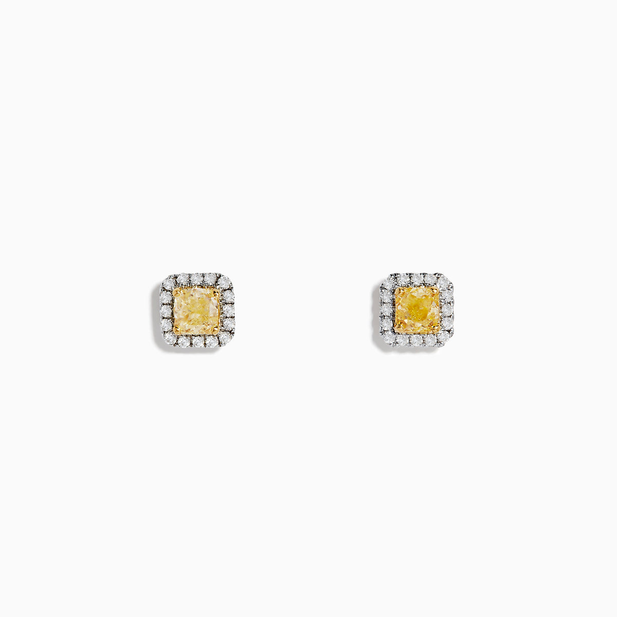 The Canare 18K Two-Tone Gold Cushion Cut Yellow Diamond Halo Stud Earrings feature yellow diamonds bordered by small white stones, shown against a plain white background.