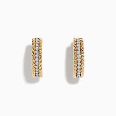 The Duo 14K Two Tone Gold 5/8 Diamond Hoop Earrings feature a twisted rope design and a vertical row of sparkling diamonds at the center.