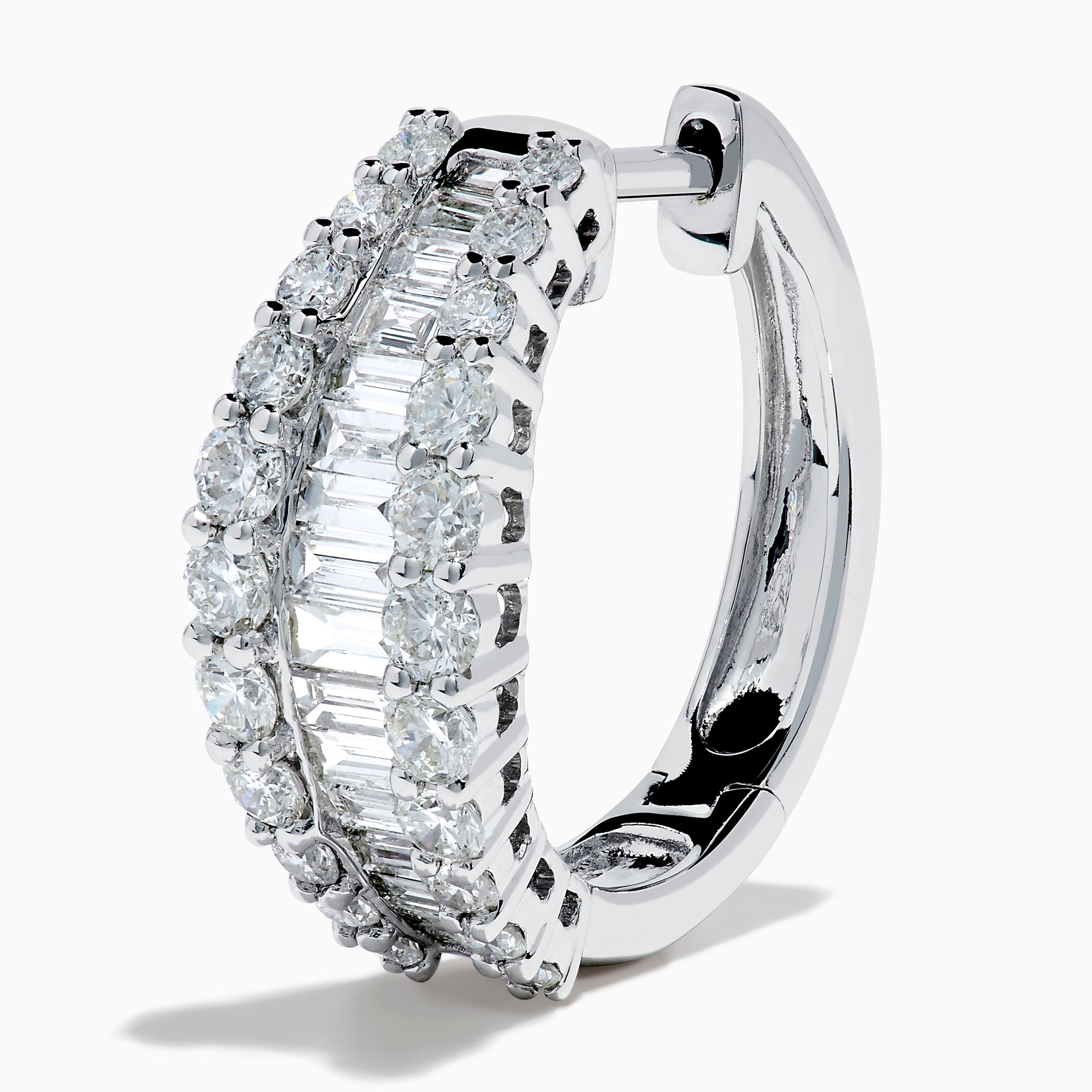 The Classique 14K White Gold Diamond Hoop Earrings feature rows of rectangular and round-cut diamonds, offering a sparkling and timeless look, beautifully displayed on a plain white background.