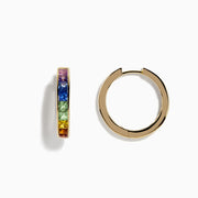 The Watercolor 14k Yellow Gold Princess Cut Multi Sapphire Hoop Earrings feature a rainbow gradient of square-cut sapphires—purple, blue, green, yellow, and orange—set on hoops and shown against a white background.