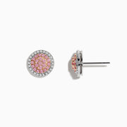 These 14K Two Tone Gold Pink and White Diamond Earrings feature a cluster of pink stones at the center, encircled by clear diamonds in a round design.