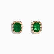 The Brasillica 14K Yellow Gold Emerald and Diamond Earrings feature rectangular green gems bordered by sparkling diamonds on a plain white background—ideal for those seeking elegant and luxurious emerald stud earrings.