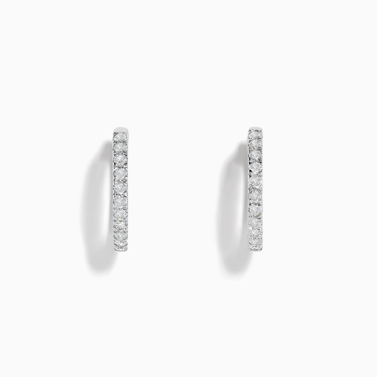 A pair of Pave Classica 14k White Gold 5/8 Diamond Hoop Earrings 0.49 TCW, featuring sparkling diamonds, displayed against a plain white background.