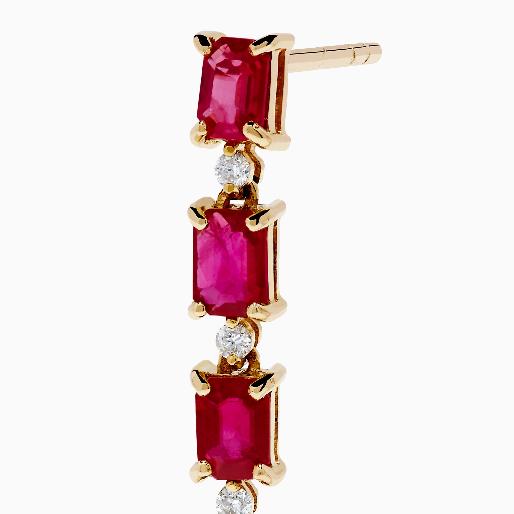 The 14K Yellow Gold Ruby and Diamond Linear Drop Earrings showcase alternating rectangular rubies and small round diamonds arranged vertically for an elegant, modern look.